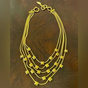 Diane Von Furstenberg Elegant Gold tone Necklace with 5 rows chain with squares